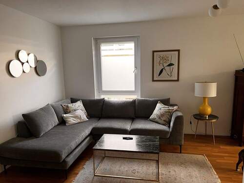 Wohnzimmer - Terrassenwohnung mit 52,10 m&sup2; in München zum Kaufen