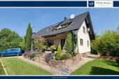 Titel 2 - Einfamilienhaus mit attraktivem Außenbereich und moderner Ausstattung
