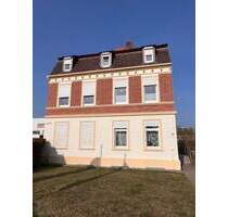 Überschaubares Investmenthaus mit Baugrundstück - Grevesmühlen