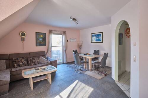 Wohnzimmer mit Essbereich im OG - 