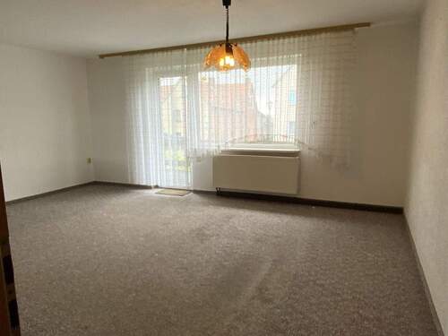 Wohnzimmer mit Ausgang zur Terrasse - 