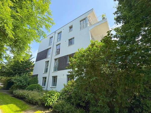Seitliche Hausansicht - 4 Zimmer Etagenwohnung zum Kaufen in Wedel