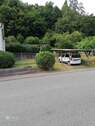  Strassenansicht zum Carport - 