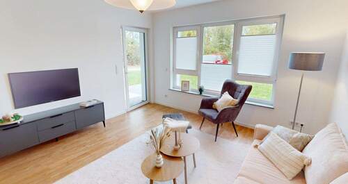 WOHNZIMMER MIT TERRASSENZUGANG - BARRIEREFREI. GEMÜTLICH. MODERN. - EIN ZUHAUSE, DAS BLEIBT.