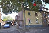 Titelbild - Zweifamilienhaus mit Garage und großem Grundstück
