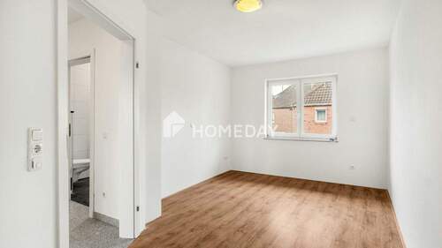 1. OG Schlafzimmer 1 - 