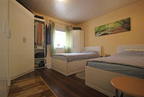 Schlafzimmer im Erdgeschoss - 