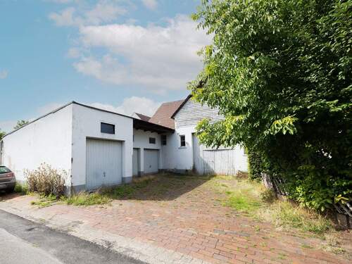 Rückansicht - 1 Zimmer Mehrfamilienhaus, Wohnhaus zum Kaufen in Bünde