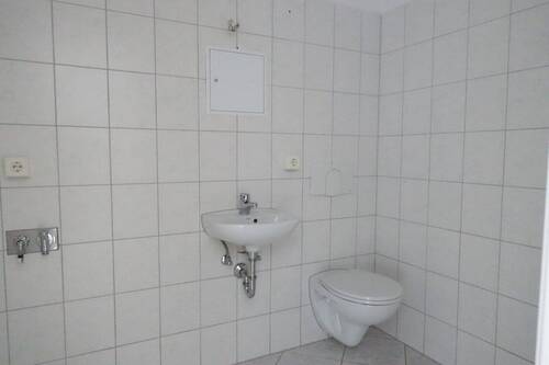 Musterbild Gäste-WC mit Anschluss Waschmaschine - 