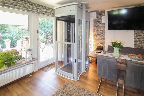 Lift im Wohnzimmer - geöffnet - 4 Zimmer Einfamilienhaus in Helvesiek