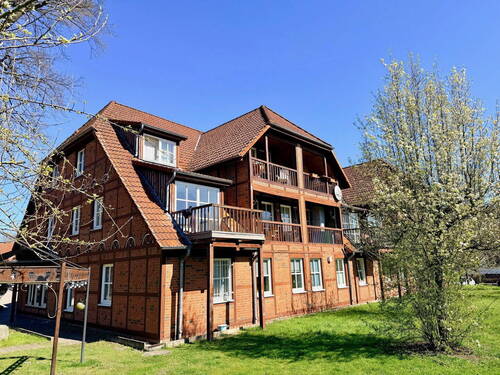 Hausansicht Garten - 2 Zimmer Etagenwohnung zum Kaufen in Wedemark