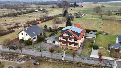 Luftansicht - 1 Zimmer Mehrfamilienhaus, Wohnhaus zum Kaufen in Hasselroth