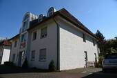 Seitenansicht Haus - 3 Zimmer Etagenwohnung zum Kaufen in Gütersloh