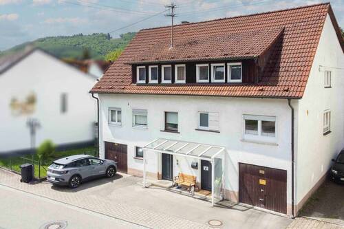 Außenansicht - MFH mit 2 Einheiten und Wertsteigerungspotenzial in Feldrandlage zur flexiblen Nutzung