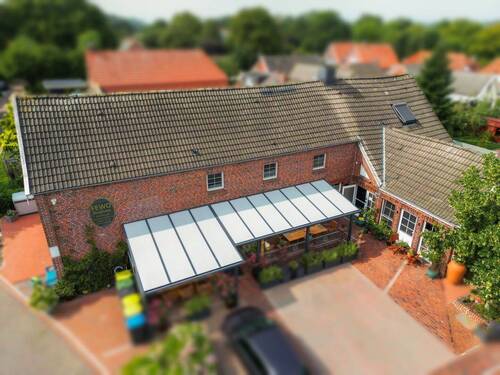 Luftaufnahme - 5 Zimmer Terrassenwohnung in Krummhörn