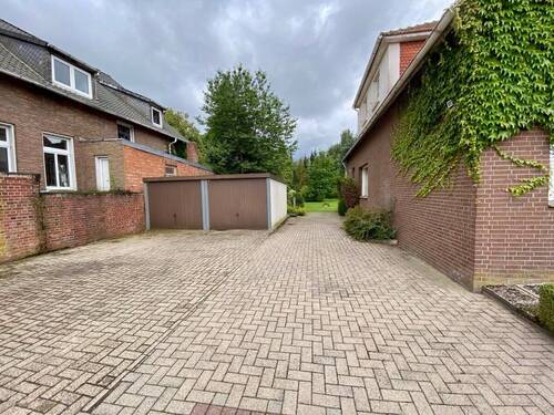 Hof mit Doppelgarage - Mehrfamilienhaus, Wohnhaus mit 153,10 m&sup2; in Fürstenau zum Kaufen