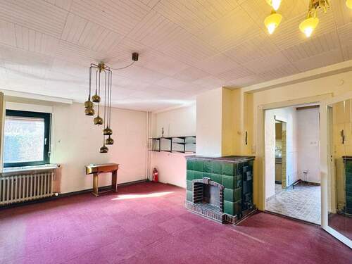 Wohnbereich mit Kamin - Mehrfamilienhaus, Wohnhaus mit 115,00 m&sup2; in Berlin zum Kaufen