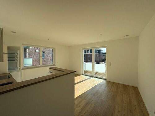 Wohnzimmer mit Südbalkon - 3 Zimmer Etagenwohnung in Schneverdingen