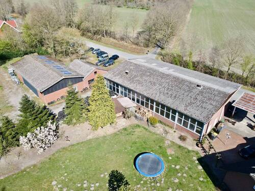 Lauftaufnahme - Mehrfamilienhaus, Wohnhaus zum Kaufen in Bippen / Ohrtermersch