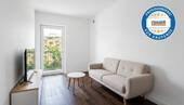 Wohnzimmer möbliert KI - 3-Zimmer-Wohnung im Altbau-Ensemble mit Balkon und TG in München-Sendling