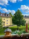 Sommerlicher Ausblick KI - 3 Zimmer Etagenwohnung in München