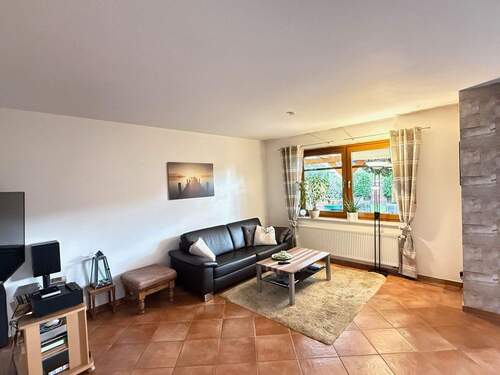 Wohnzimmer - Einfamilienhaus mit 139,50 m² in Bramsche zum Kaufen