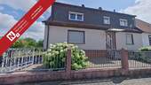 Eingang_Straßenseite - Eine Vielzahl an Nutzungsmöglichkeiten - 1-2-Familienhaus mit Baugrundstück in zweiter Reihe