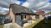 Hinteransicht mit Terrasse - Einfamilienhaus mit 133,30 m&sup2; in Lübow zum Kaufen