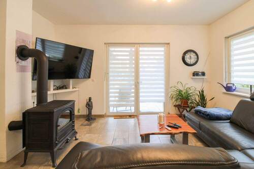 Wohnbereich mit Kamin - Einfamilienhaus mit 129,20 m&sup2; in Blankenfelde-Mahlow zum Kaufen