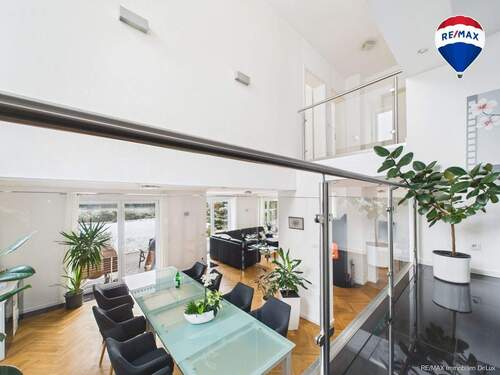 REMAX Immobilien DeLux Einfamilienhau Wohnzimmer Neunkirchen Mark Borowicz - 7 Zimmer Einfamilienhaus in Neunkirchen