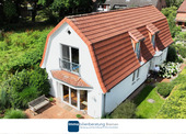 Immobilienberatung Bremen - Freistehendes Einfamilienhaus in familienfreundlicher Lage mit Südterrasse und Carport