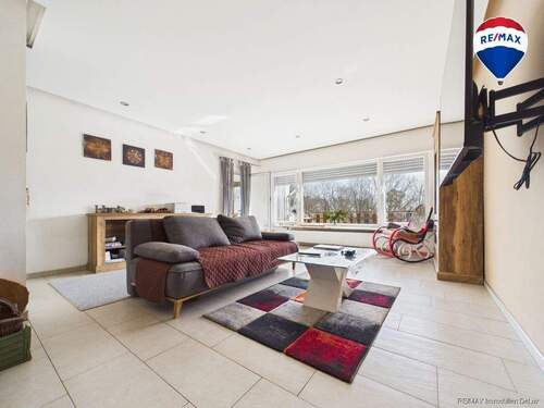 REMAX Immobilien DeLux Einfamilienhaus Wohnzimmer Bexbach Mark Borowicz - Einfamilienhaus zum Kaufen in Bexbach