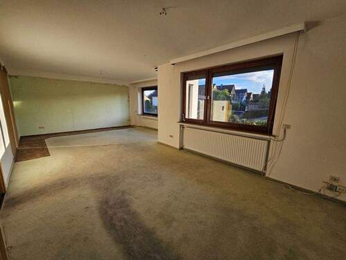 Wohnzimmer (3) EG - Doppelhaushälfte mit 146,00 m² in Delmenhorst zum Kaufen