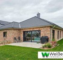 Ebenerdig wohnen mit geschützter Terrasse Niedrigenergiehaus EH40 - Neubauprojekt in Wacken