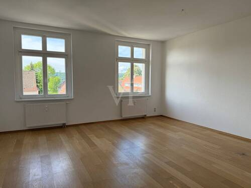 Wohnzimmer - Etagenwohnung mit 113,00 m&sup2; in Radebeul zum Kaufen