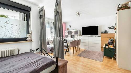 Wohnzimmer 1 - 1 Zimmer Etagenwohnung in Gröbenzell