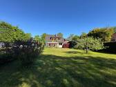 Haus mit dem herrlichen Garten - Exklusives Wohnen: Sonnendurchflutetes Haus mit idyllischem Gartenparadies in traumhafter Lage