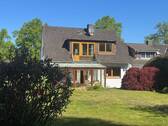 Ansicht mit Wintergarten und Balkon - 