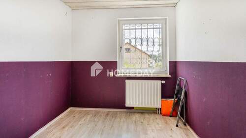 1. OG Schlafzimmer 1 - 