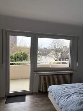 Schlafzimmer mit Balkon - 