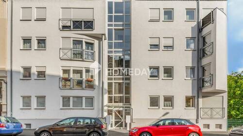 Außenansicht 1 - Gepflegte 3-Zimmer-Eigentumswohnung mit Südwest-Balkon & außergewöhnlicher Stellplatzsituation