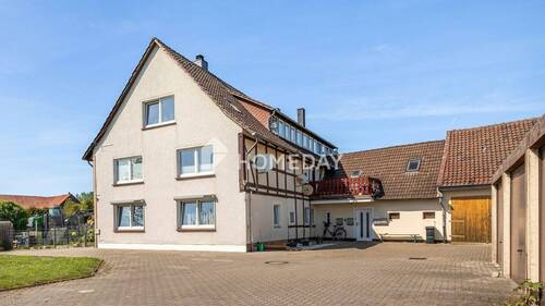 Außenansicht 3 - Vollvermietetes MFH mit 6 Wohneinheiten - ca. 433 m² Wohnfläche auf etwa 1.875 m² Grundstück