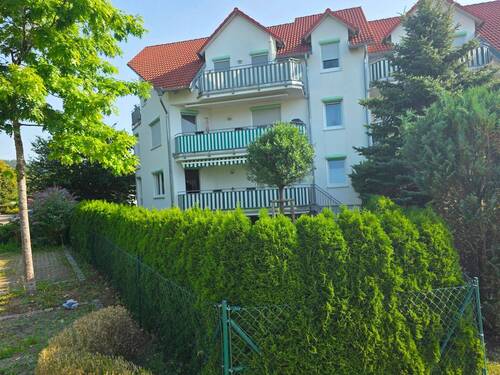 Südwestansicht - schöne gepflegte 4 Zimmerwohnung im Erdgeschoss mit Garten und Garage