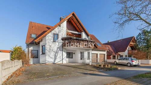 Außenansicht 1 - Großzügiges Wohnhaus mit Einliegerwohnung und attraktiver Einnahmeperspektive