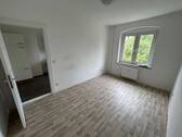 Wohnzimmer - 2 Zimmer Etagenwohnung in Magdeburg