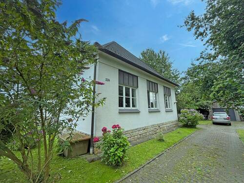 Ansicht Seite - Mehrfamilienhaus, Wohnhaus mit 300,00 m² in Bünde zum Kaufen