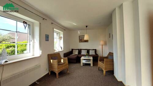 Wohnzimmer - Einfamilienhaus mit 89,60 m² in Friedrichskoog zum Kaufen