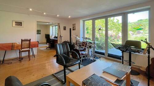 Arbeits-, Hobby- oder Gästezimmer im Gartengeschoss - 