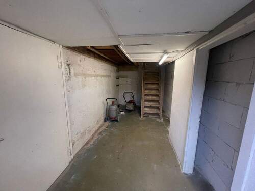 Werkstatt mit Aufgang zum Speicher - 