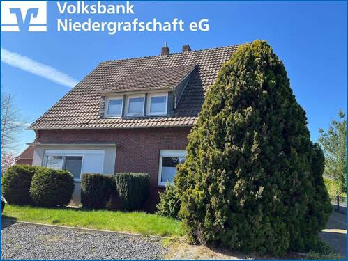 Vordere Ansicht - Einfamilienhaus mit großem Garten für kreative Köpfe